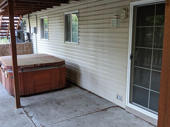Lower patio with hot tub