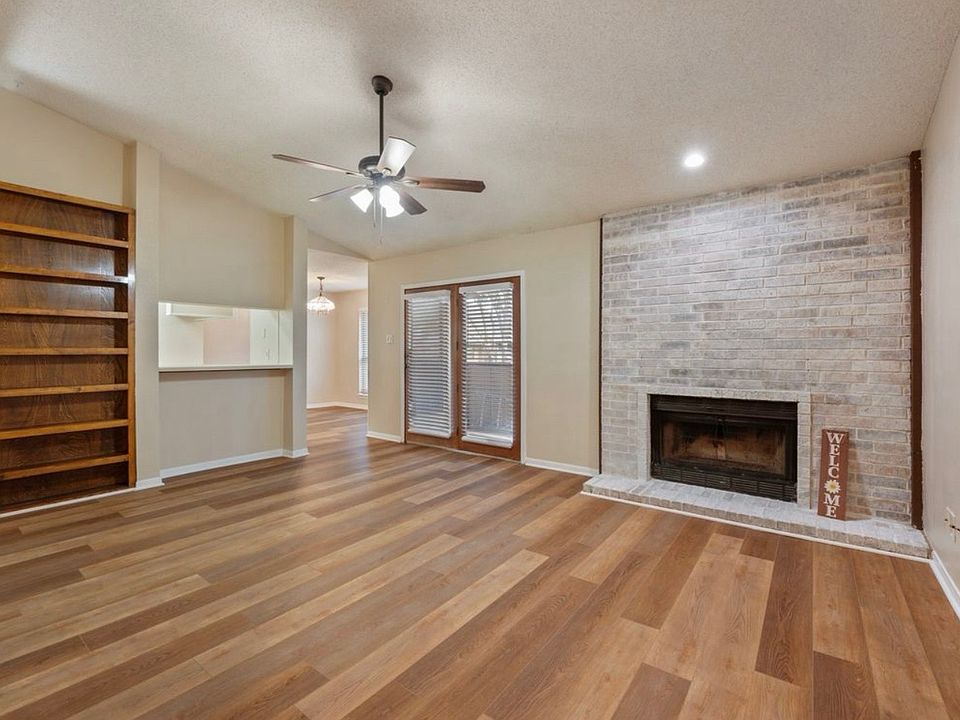 living room with wood-burning fireplace