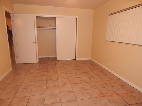 Tiled Bedroom with Closet