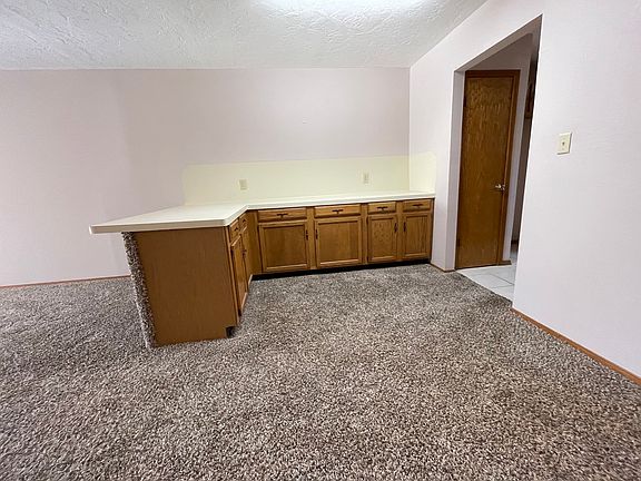 Bar area with lots of counter and cabinet space