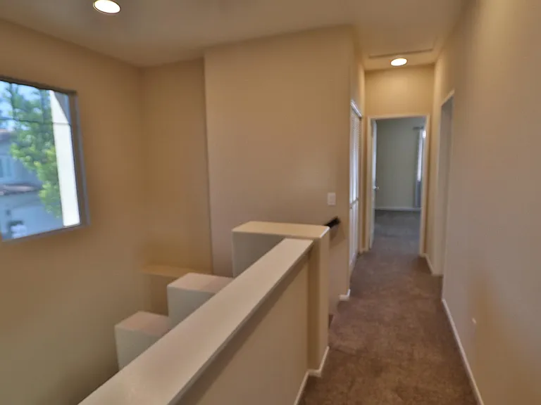 Hall way leads to the Master Suite