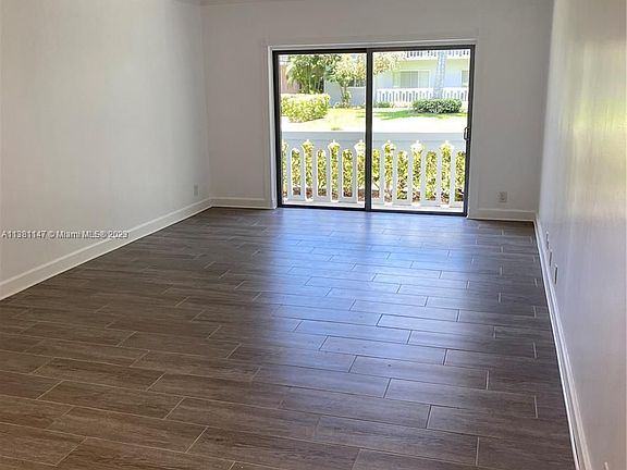 5th image of 100 Edgewater Dr APT 112