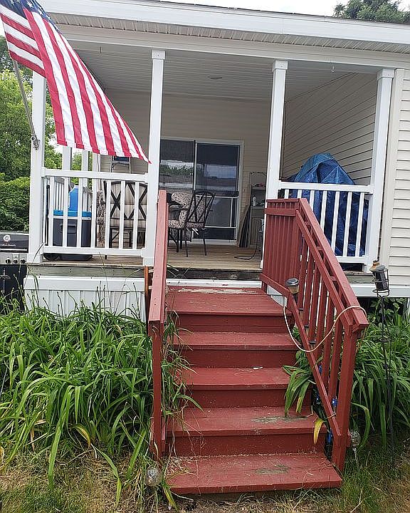 Rear entrance with covered deck
