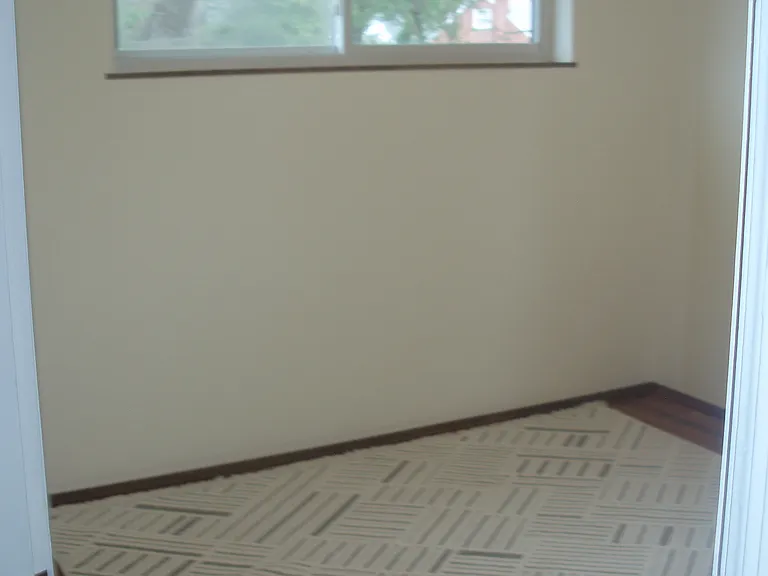 1st floor bedroom, 11x11, all rugs stay on site.