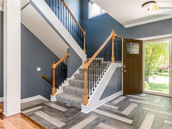 Remodeled Entry Tile, Upgraded Front Door, Stair Carpet & Wrought Iron Spindles!
