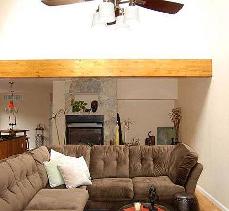 Living room looking up to loft office