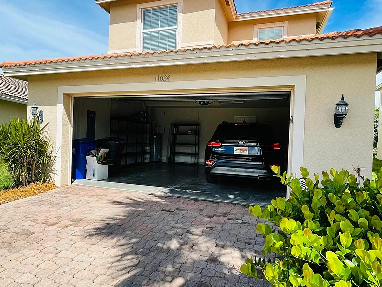 Real 2 car garage with storage shelves