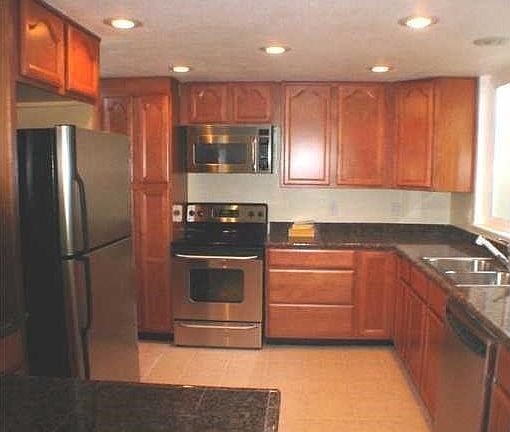 Beautiful kitchen with door to patio.