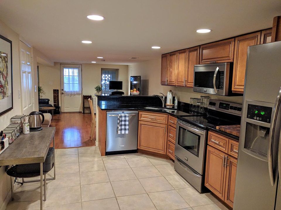 View of the kitchen, looking towards the front door.