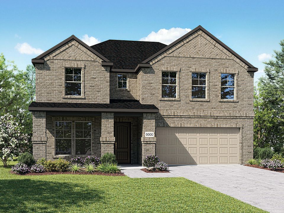 A two-story brick house with a gabled roof, surrounded by a well-manicured lawn and lush greenery in