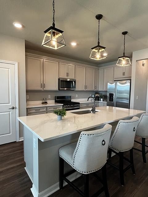 Kitchen with stainless steel appliances