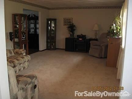 Family Room
						:
						Built in vented gas long fireplace bookshelves, cabinets and desk.