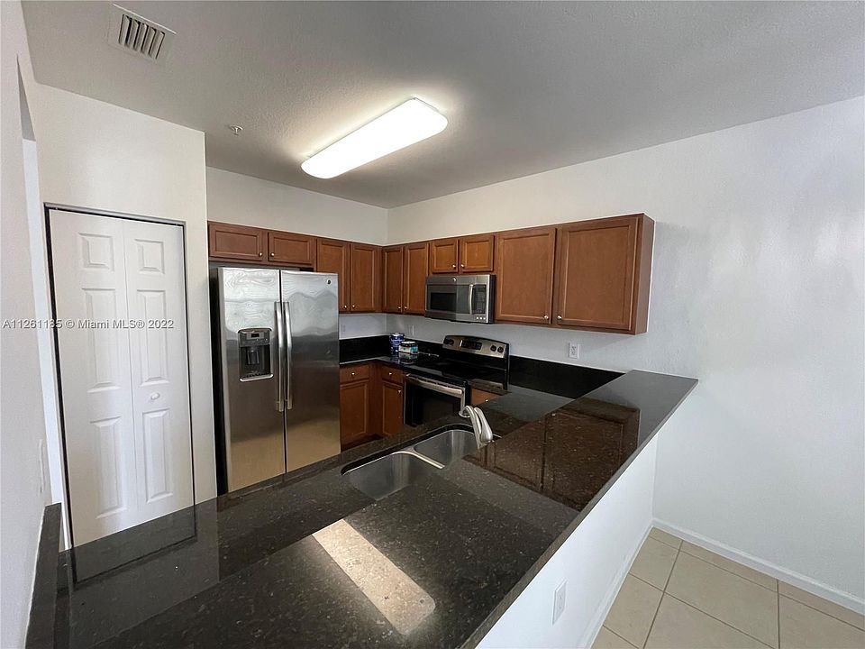 1st image of 8760 NW 97th Ave APT 211