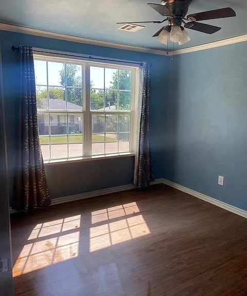 Converted garage room - windows face the street