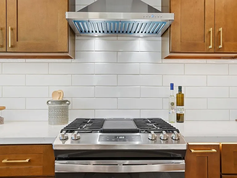 Professional-style gas range with modern finishes