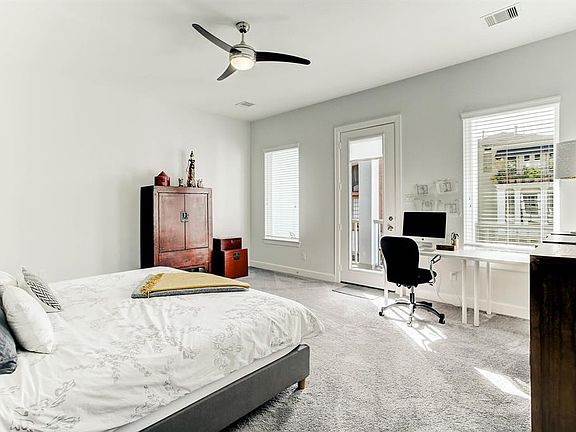 Second story primary bedroom features a private balcony!