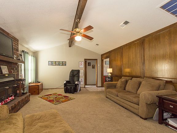 Great Room. Plenty of options for your furniture placement. Through the door are the two secondary bedrooms and hall bath.