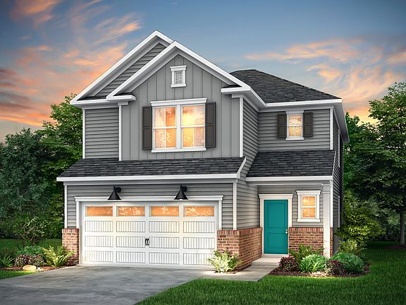 Harris Exterior LC2G features siding, brick accents, covered front porch and 2 car garage