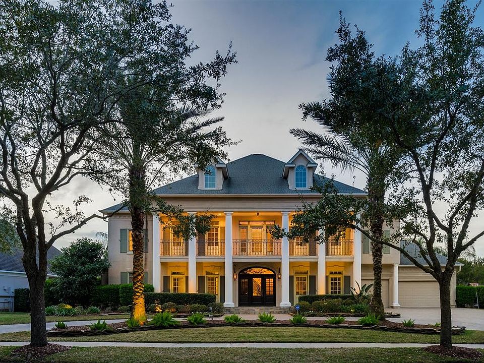 This Spectacular Showplace on scenic tree-lined street nestled behind mature Trees is a custom Builder's formal personal home and overflowing with Upgrades and Updates that will test your visual limits! Built in 2004 with custom touches throughout th