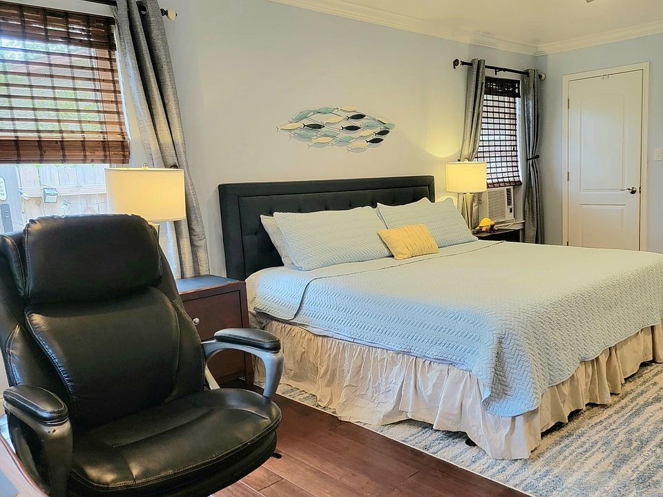 Beautiful king bed and desk.