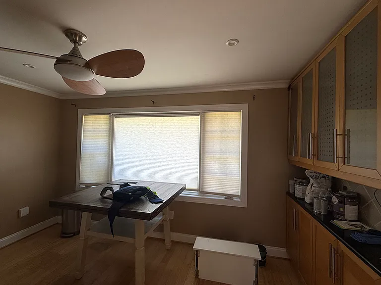 Kitchen with additional cabinets and small dinette area