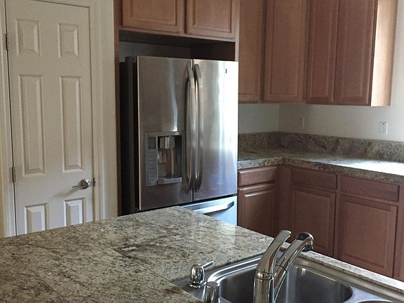 Kitchen pantry and Refrigerator