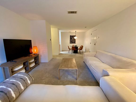 Living room area - facing dining area and kitchen