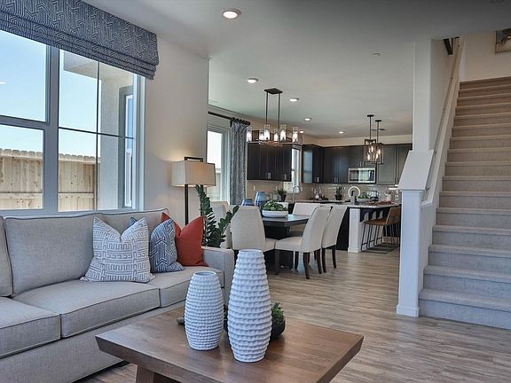 Photos with staging effect of the model home, this is an unfurnished home