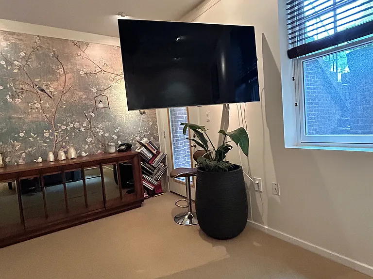 Bedroom#1 - TV on swinging arm.
