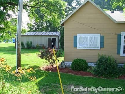 Front facing west - garage in background