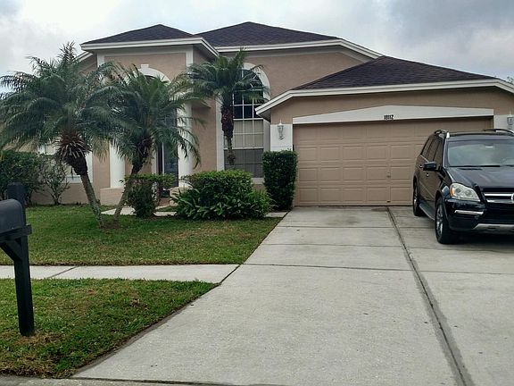 Front of Home w Benz