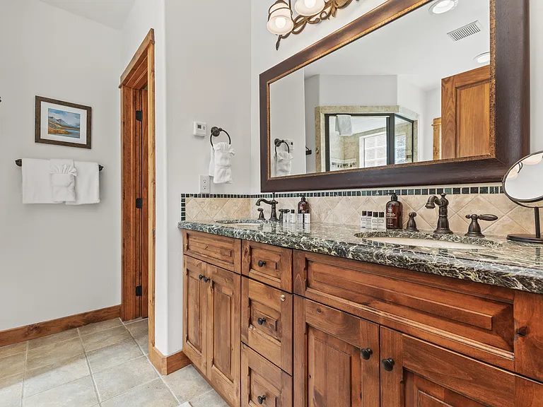 Top Level - Ensuite Bathroom 1 with Dual Sinks & Water Closet