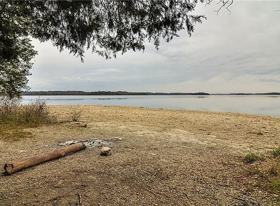 This condo is located on a Peninsula! Percy Priest Lake is just out your front