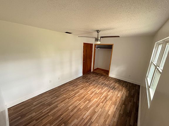 1st bedroom with closet, new floor, new window!