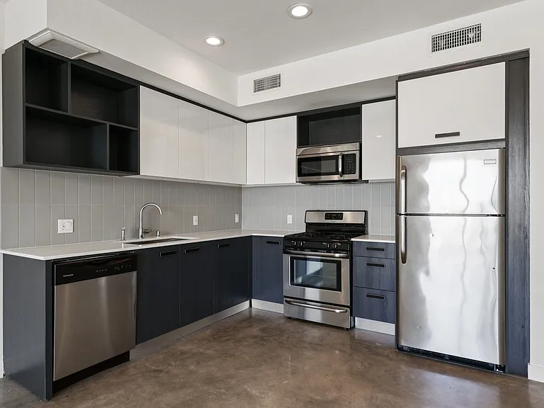 Kitchen with Stainless-Steel Refrigerator, Stove, and Dishwasher