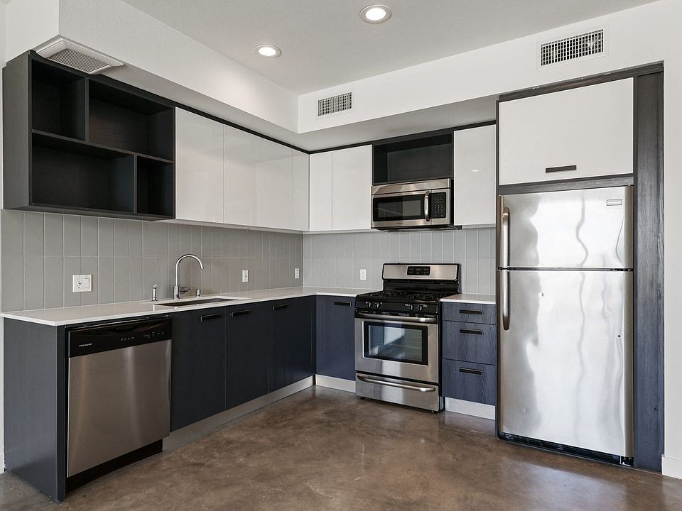 Kitchen with Stainless-Steel Refrigerator, Stove, and Dishwasher