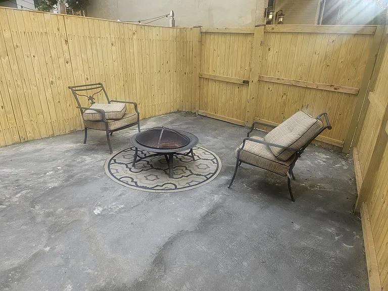 Attached spacious and private side patio measuring 13' x 17'. Perfect for grilling, outdoor dining, and entertaining.