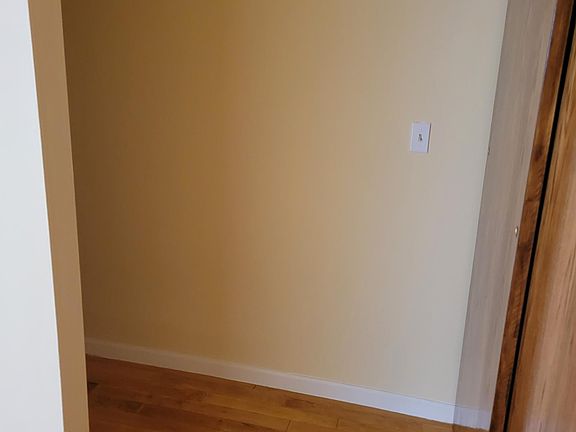 Storage space under the stairs in the living room