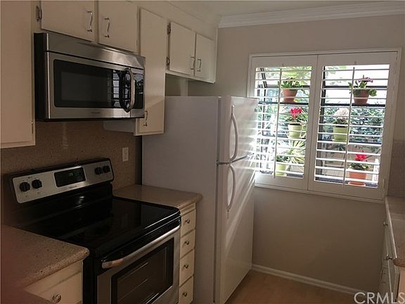 Kitchen has charming garden window