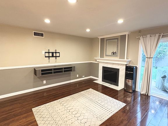 Living room, recessed lighting, hardwood flooring