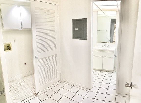 Laundry room into 1st floor bathroom