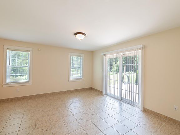 Main room view 1, facing rear of rental unit.