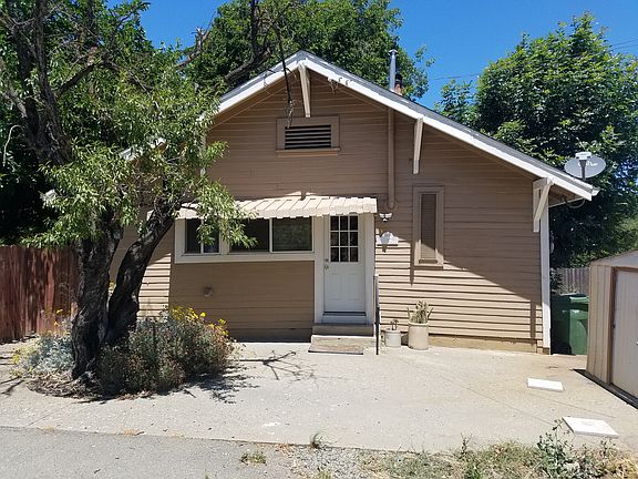 Rear of house with parking