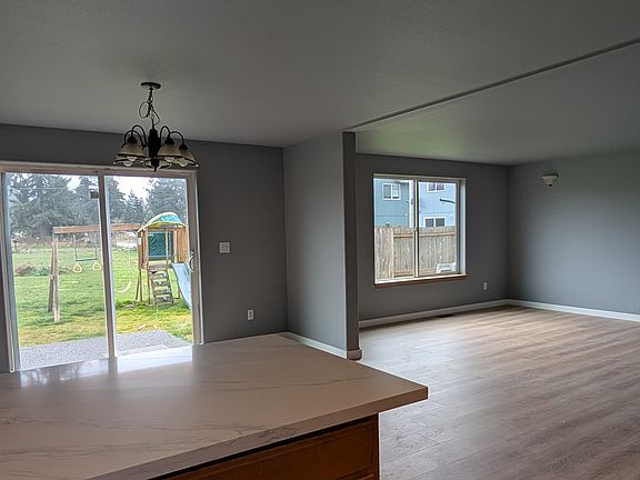 view from kitchen into dinning and living area