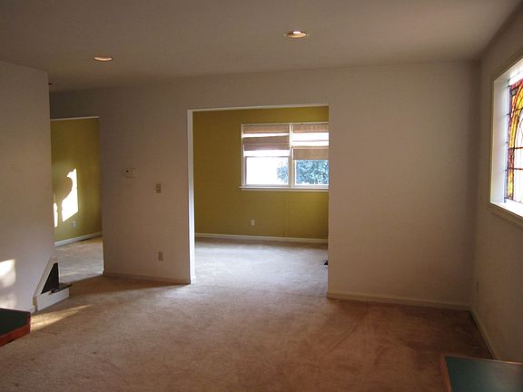 Open dining area before current paint color.