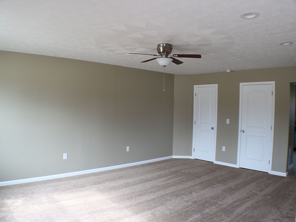 Spacious living room with half bath attached