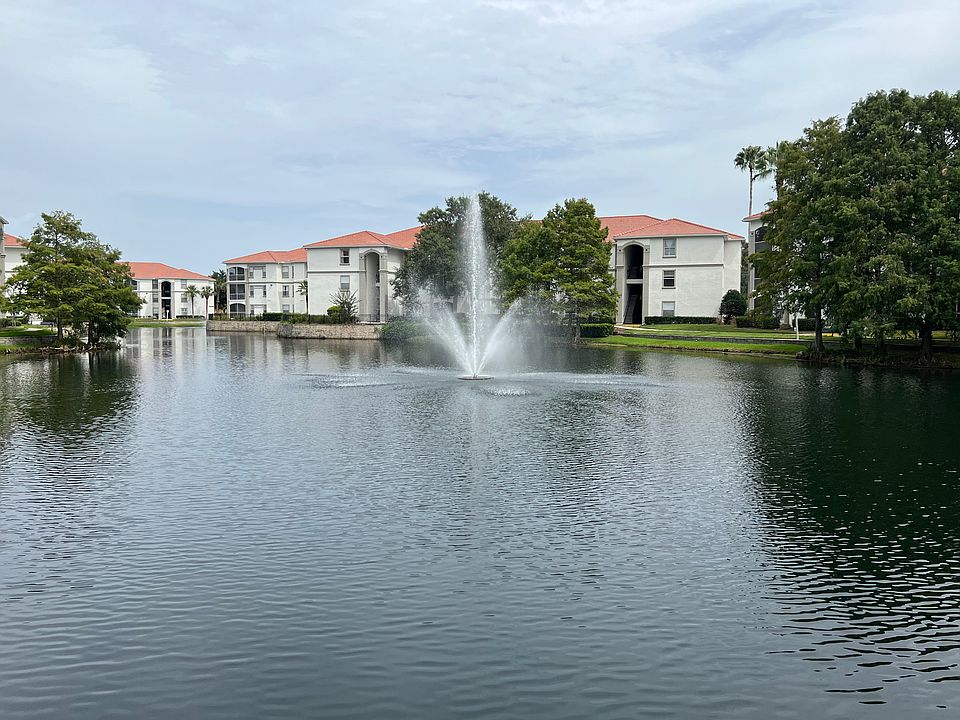 Pond in center of complex with fountain. Viewable from windows and balcony of the unit.