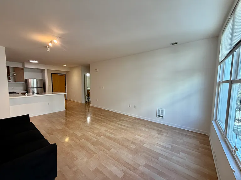 Living room. Blinds are included.