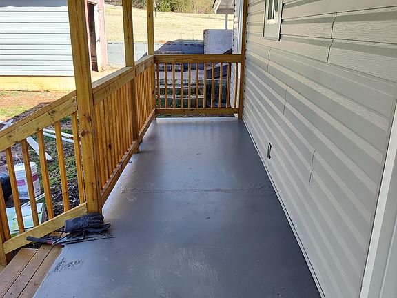 Back porch and soon to be renovated garage.