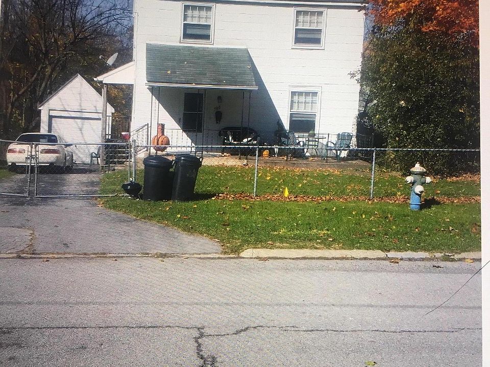 Front of the house with detached garage.